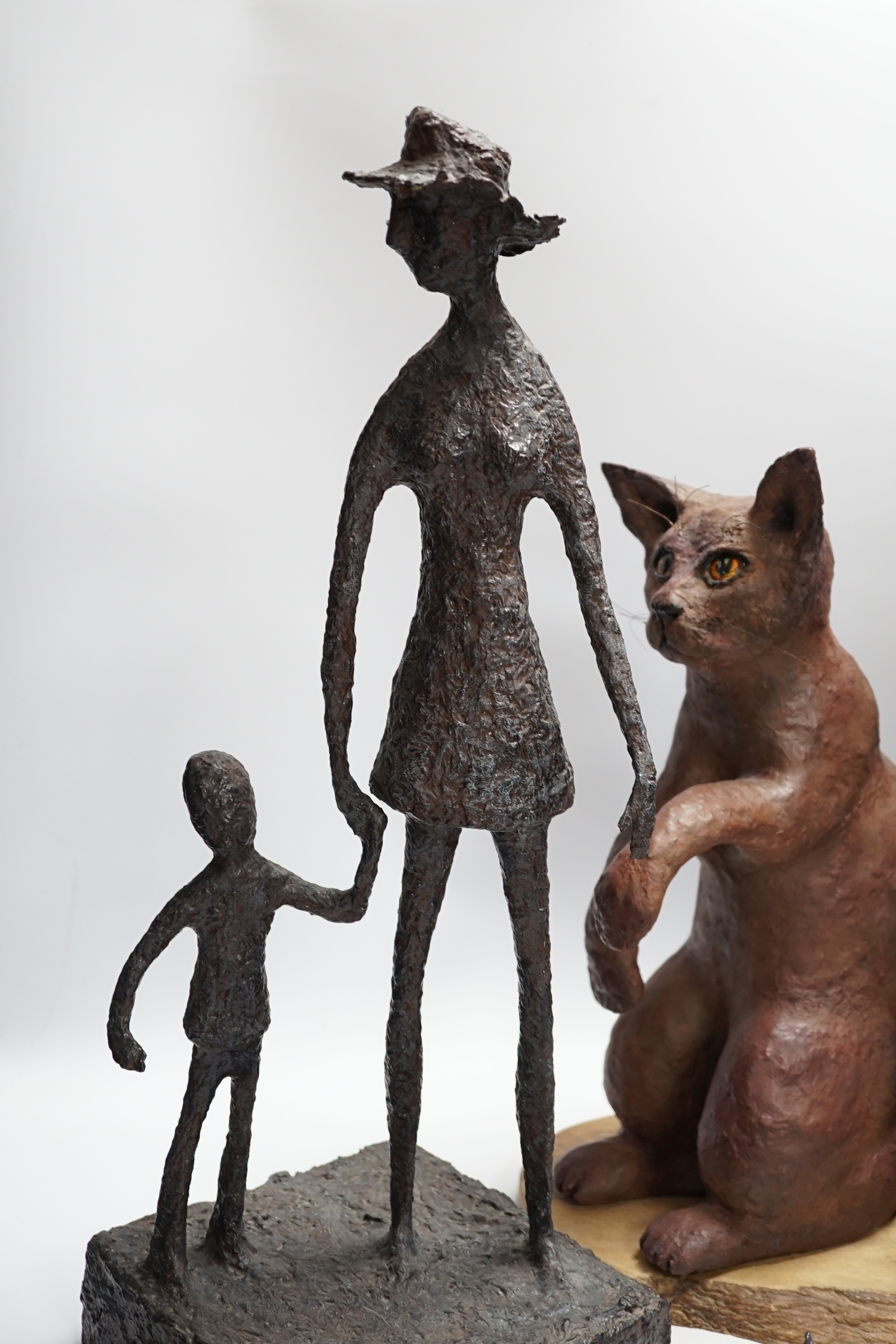 Three mixed media novelty statues, tallest 55cm high